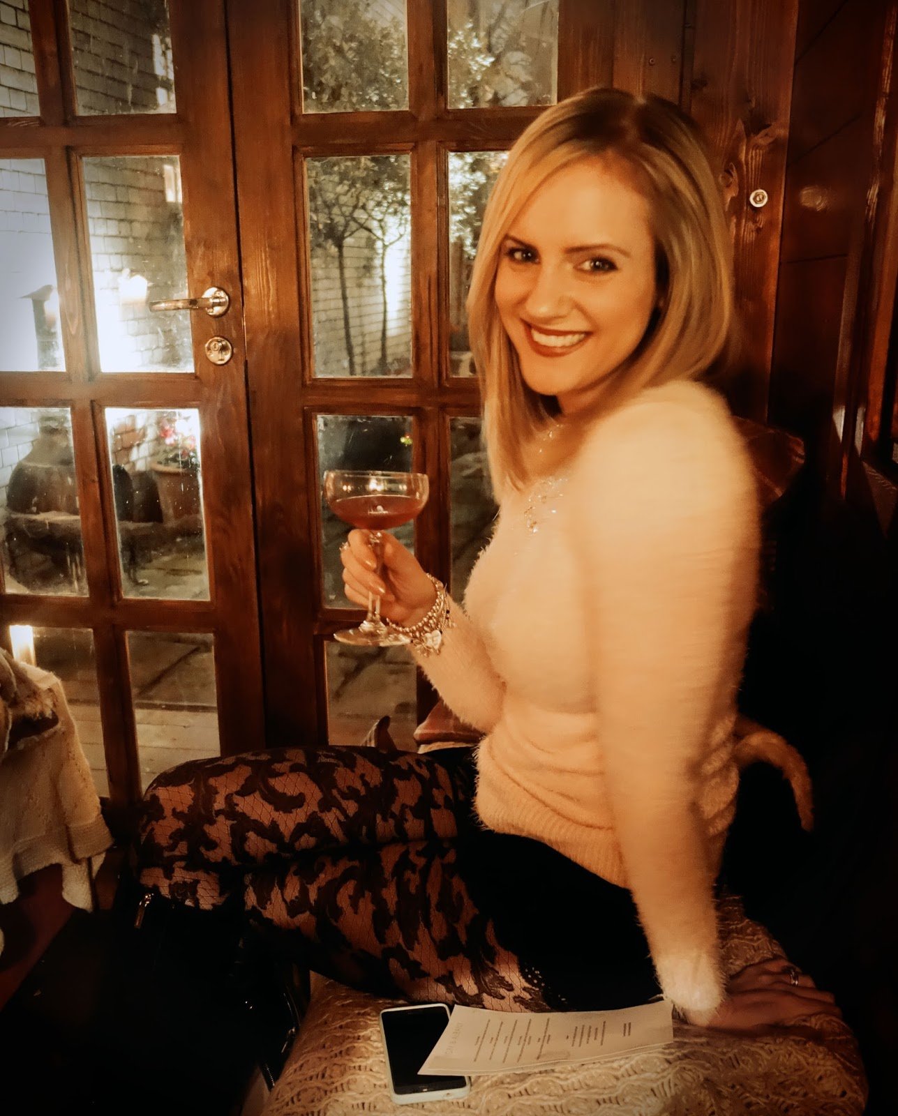 Floral patterned fishnets for a cocktails evening by Carol