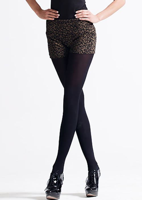 Animal print shorts with black opaque tights
